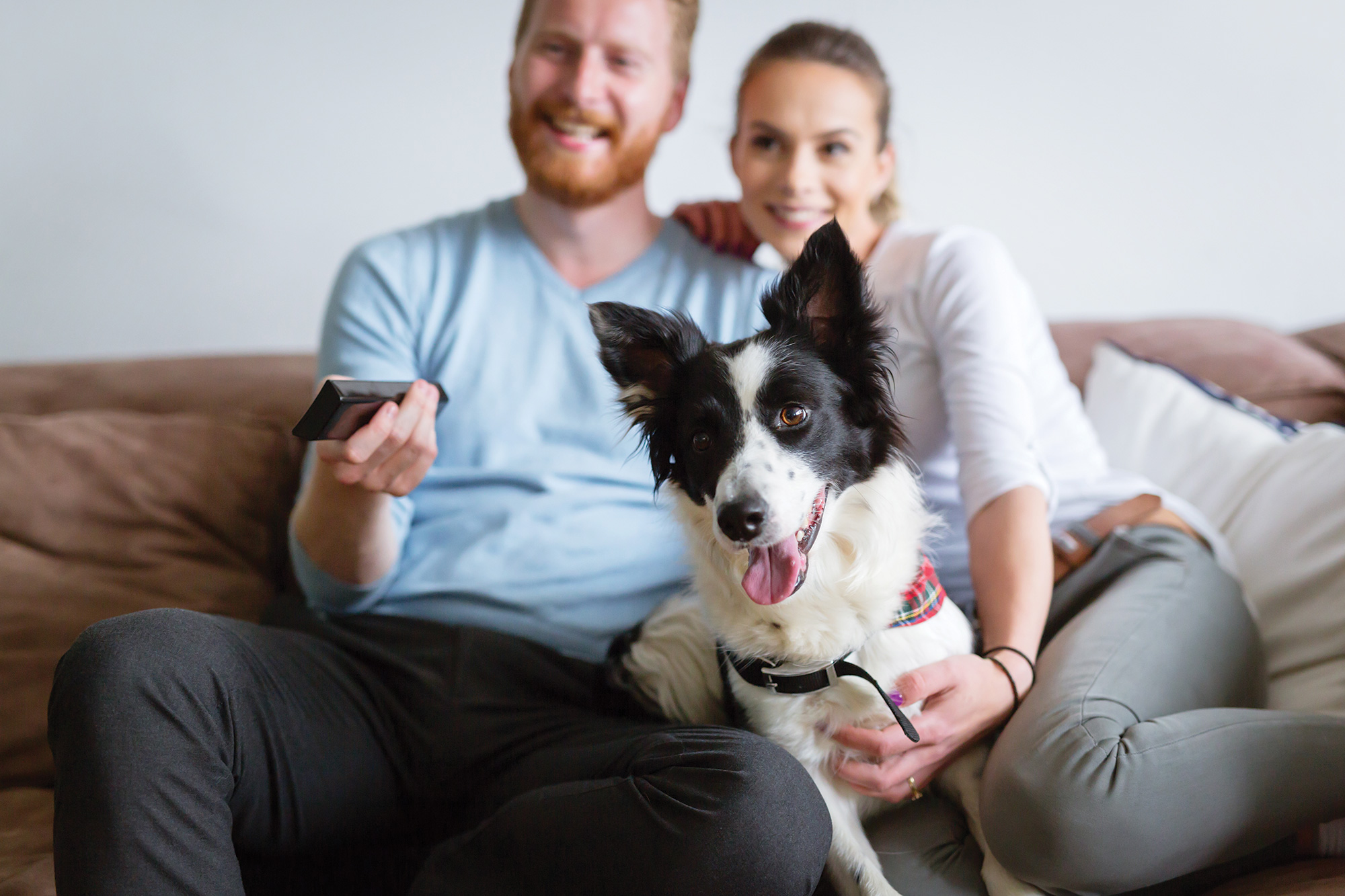 Family watching TV together